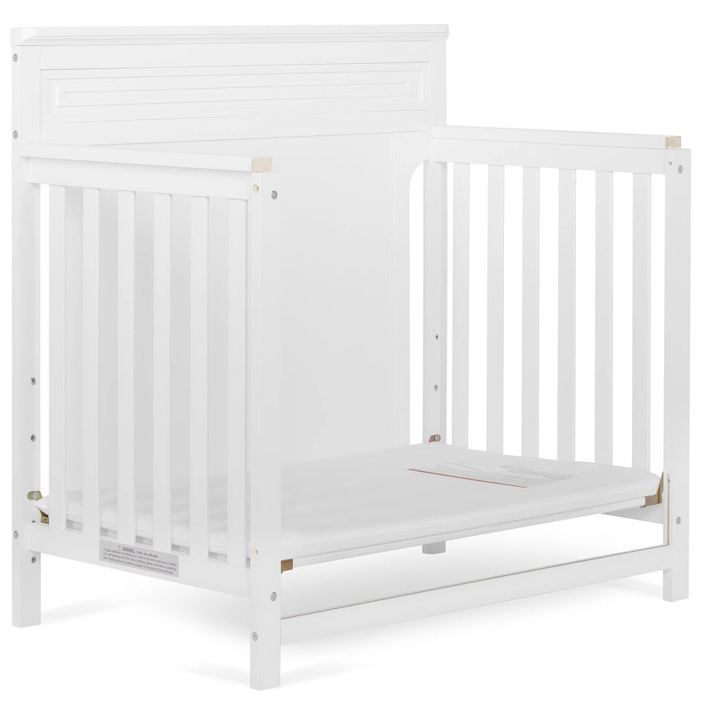 White 4-in-1 Convertible Mini Crib K347
