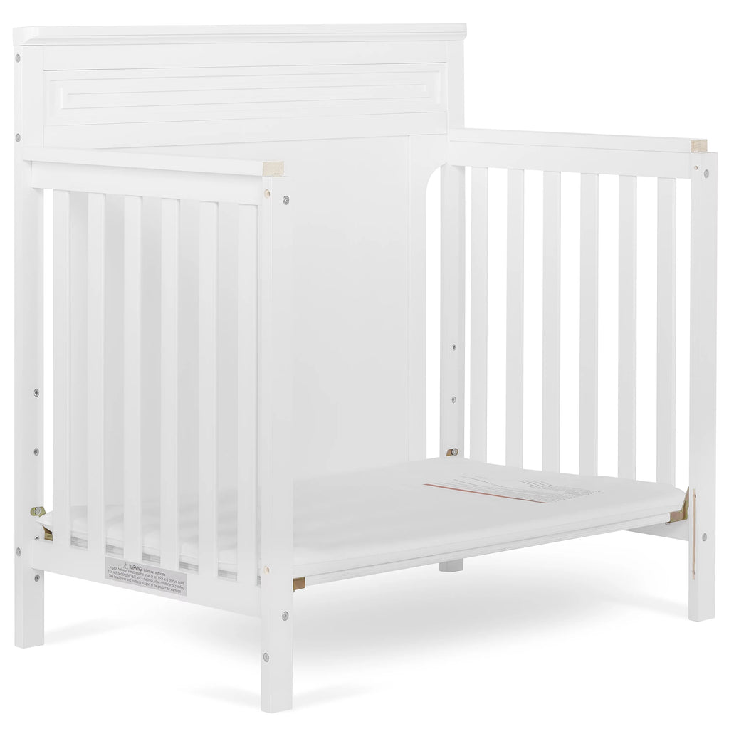 White 4-in-1 Convertible Mini Crib K347